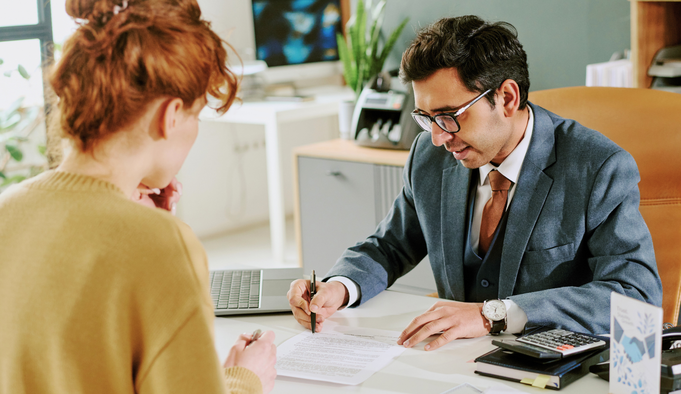 IND Meeting with paperwork and laptop.