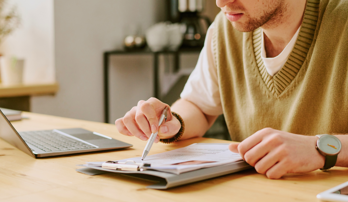 Man holding CV.