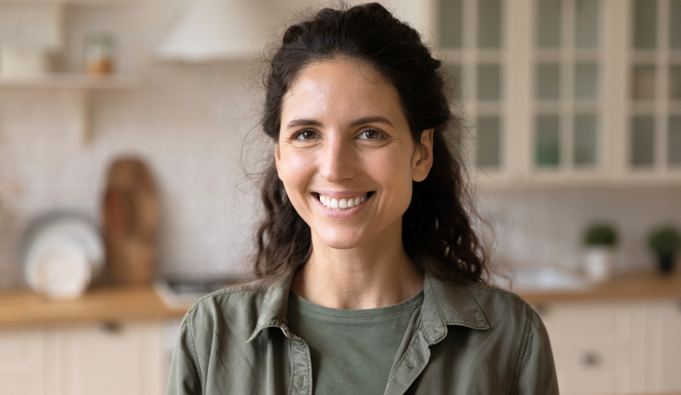 Woman smiling on her CV photo.